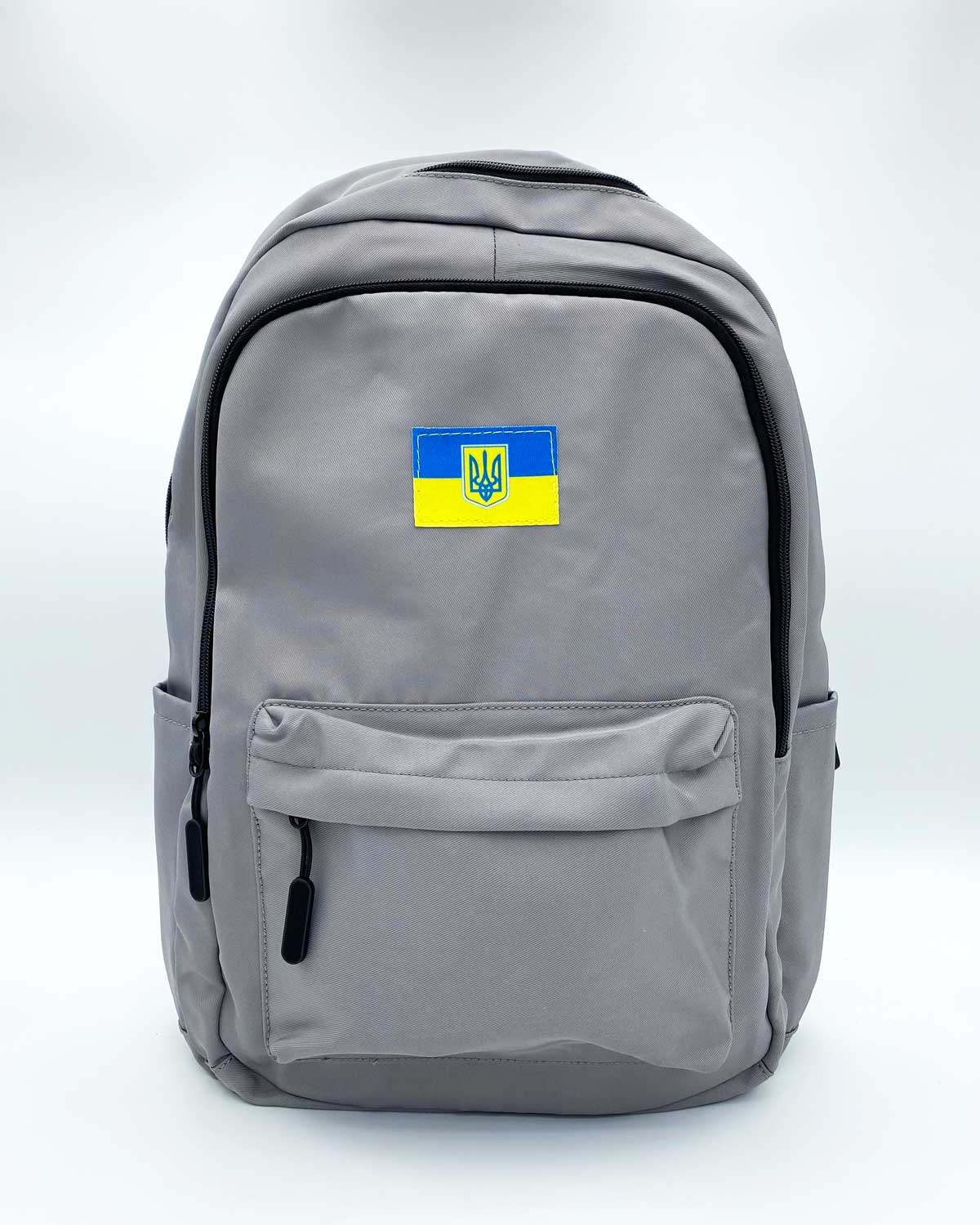 Великий тканевий рюкзак с нашивкою сірий